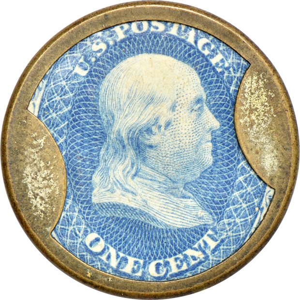 Two encased postage stamps