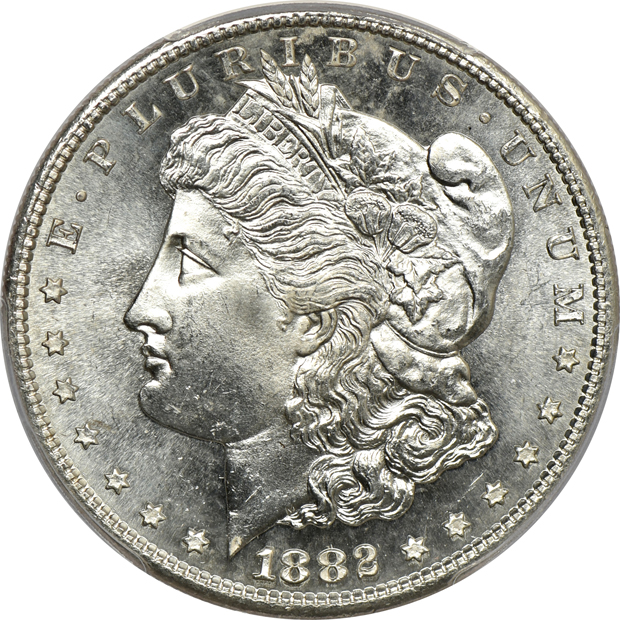 Four PCGS certified GEM Morgan silver dollars