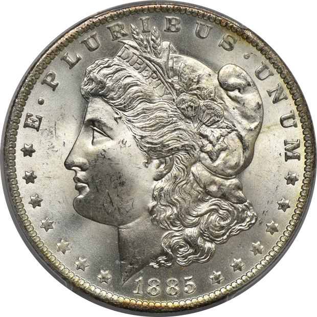 Four PCGS certified GEM Morgan silver dollars