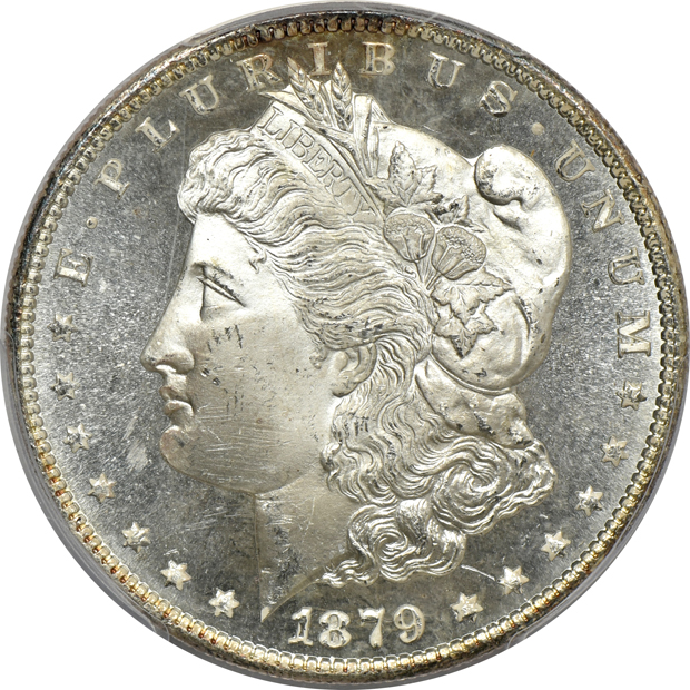Four PCGS certified GEM Morgan silver dollars