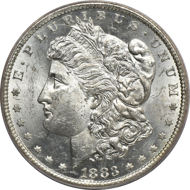 Two 1883-CC MS-63 (green label) and MS-65, both PCGS