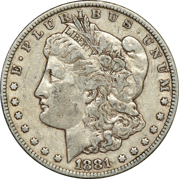 Collection of Morgan and Peace silver dollars in Dansco albums