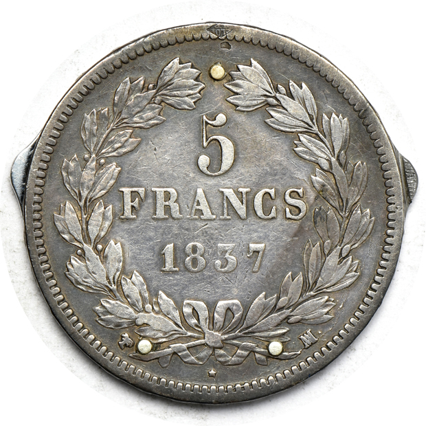 Two coin knives, plus a mix of world coins and tokens