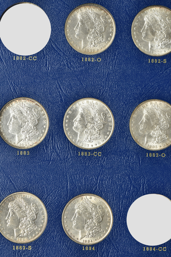 Collection of thirty-one different Morgan silver dollars, ranging from 1878 to 1886-S, in a Whitman 9427 album