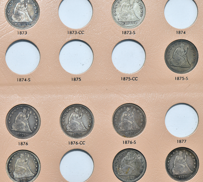 Twenty-six different Liberty Seated quarters in a Dansco 6142 album