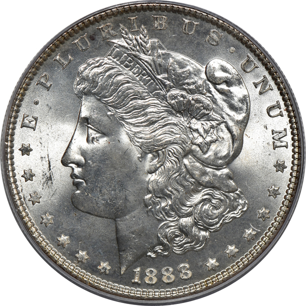 Four PCGS certified Morgan silver dollars