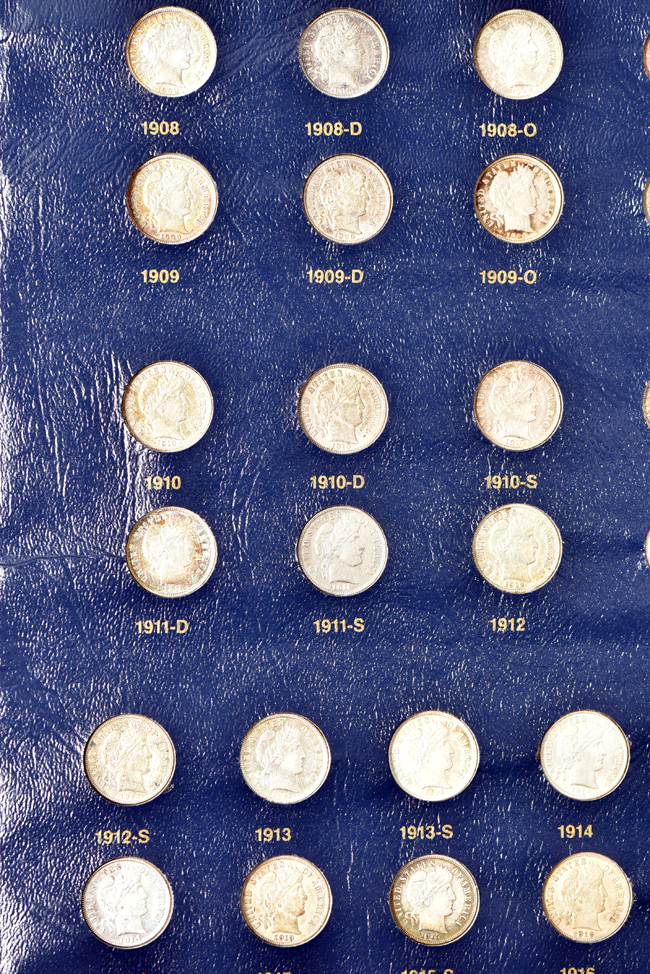 Sixty-nine different Barber dimes in a Whitman Classic 9117 album