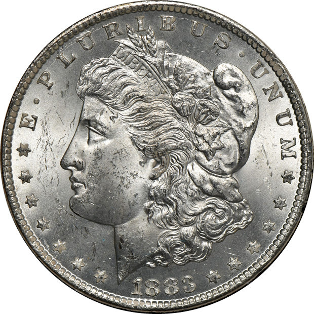 Five GSA Morgan silver dollars, as described