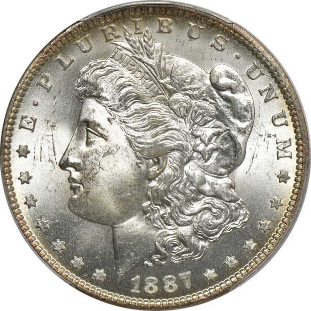 Five PCGS certified Morgan silver dollars