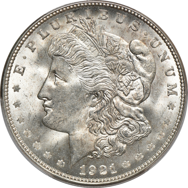 Five PCGS certified Morgan silver dollars