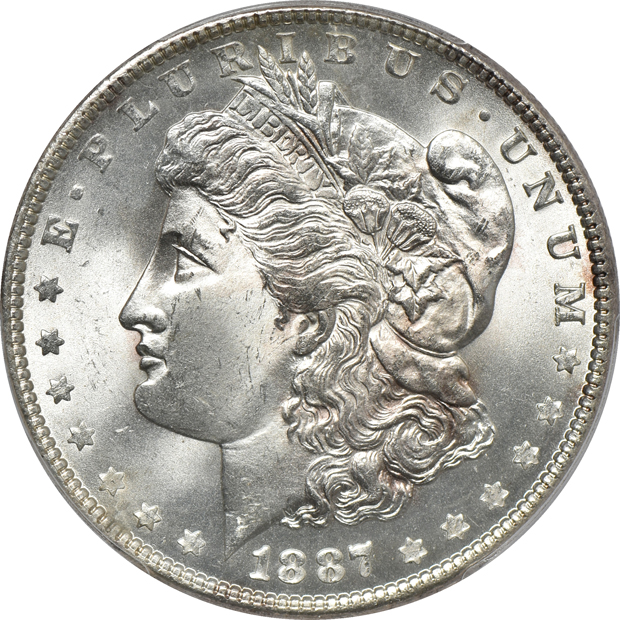 Four PCGS certified MS-65 Morgan silver dollars