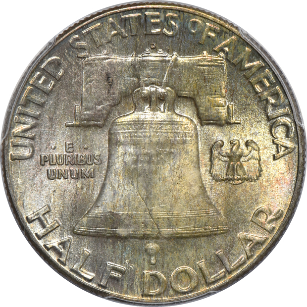 Seven Franklin half-dollars certified by PCGS