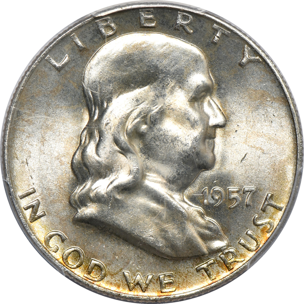Seven Franklin half-dollars certified by PCGS
