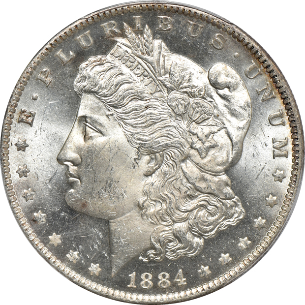 Five PCGS certified Morgan silver dollars