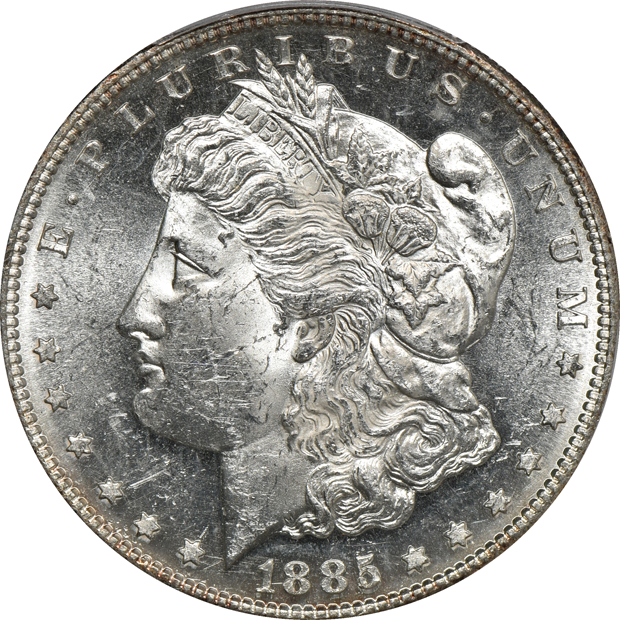 Five PCGS certified Morgan silver dollars