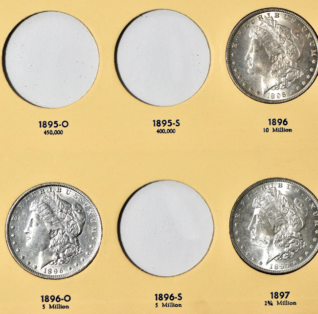 Seventeen different Morgan silver dollars in a Library of Coins Vol. 24 album