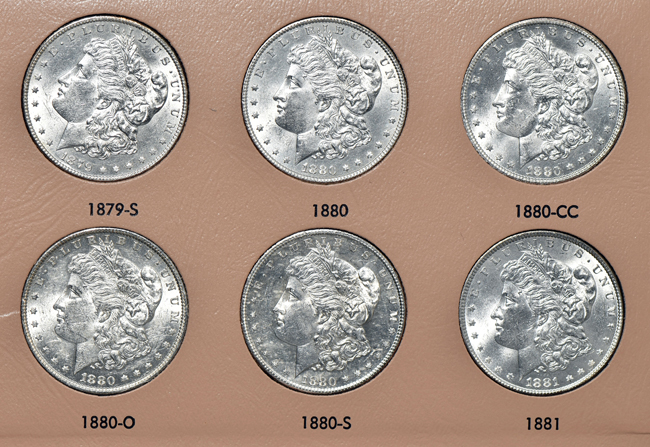 Collection of forty-four different Morgan silver dollars in a Dansco 7178 album