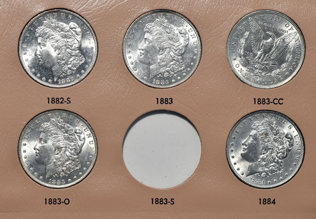 Collection of forty-four different Morgan silver dollars in a Dansco 7178 album