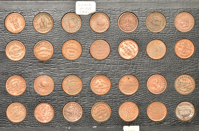 Group of twenty-eight Wisconsin Civil War tokens, most cleaned