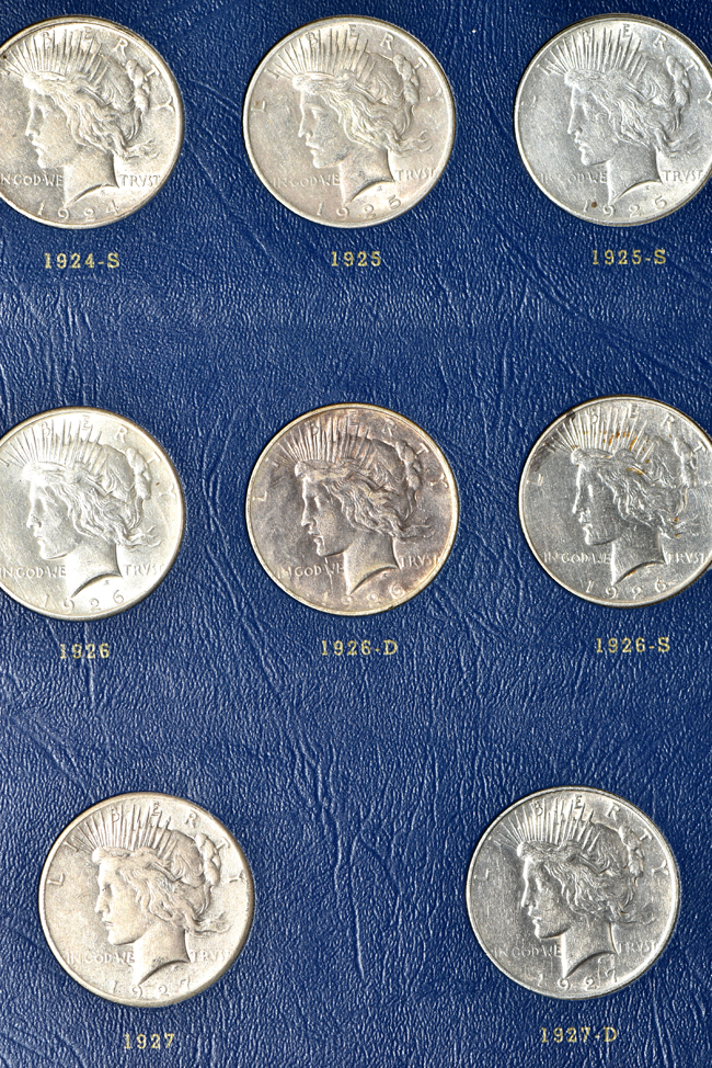 Complete collection of Peace dollars in a Whitman 9430 album