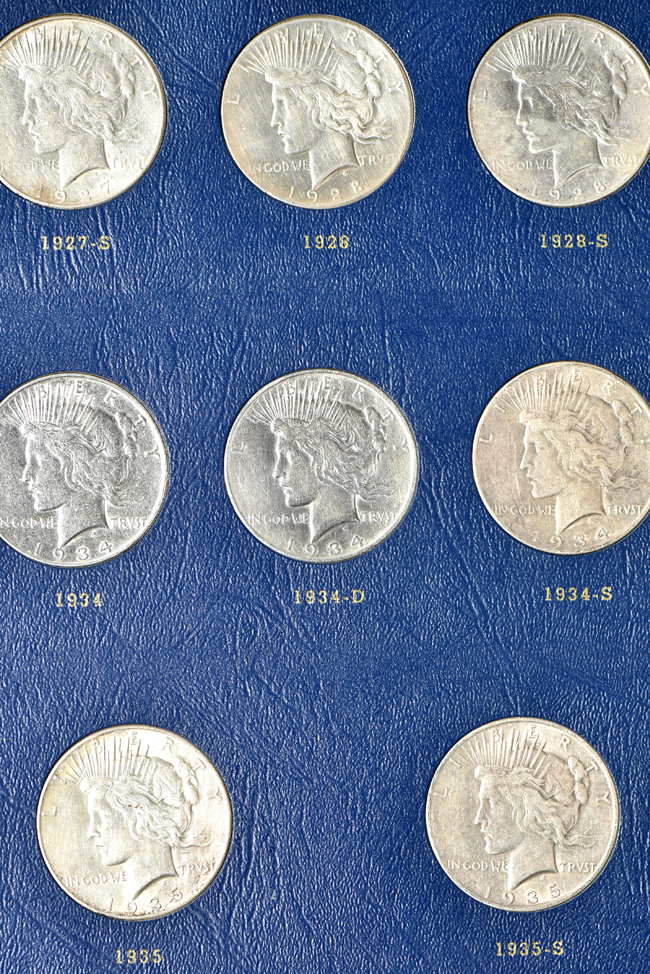 Complete collection of Peace dollars in a Whitman 9430 album