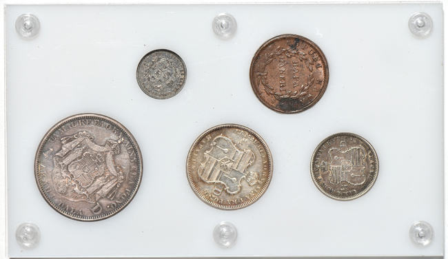 Hawaii cent, dime, quarter, half-dollar, and dollar in a Capital Plastics holder