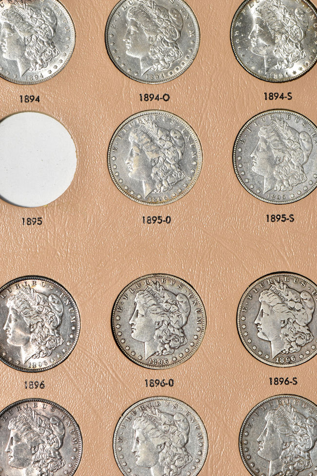 Collection of forty-six different Morgan silver dollars in a Dansco 7179 album 