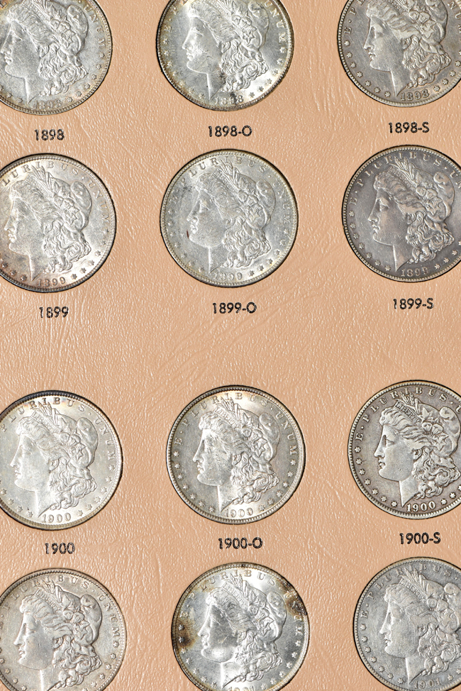 Collection of forty-six different Morgan silver dollars in a Dansco 7179 album 