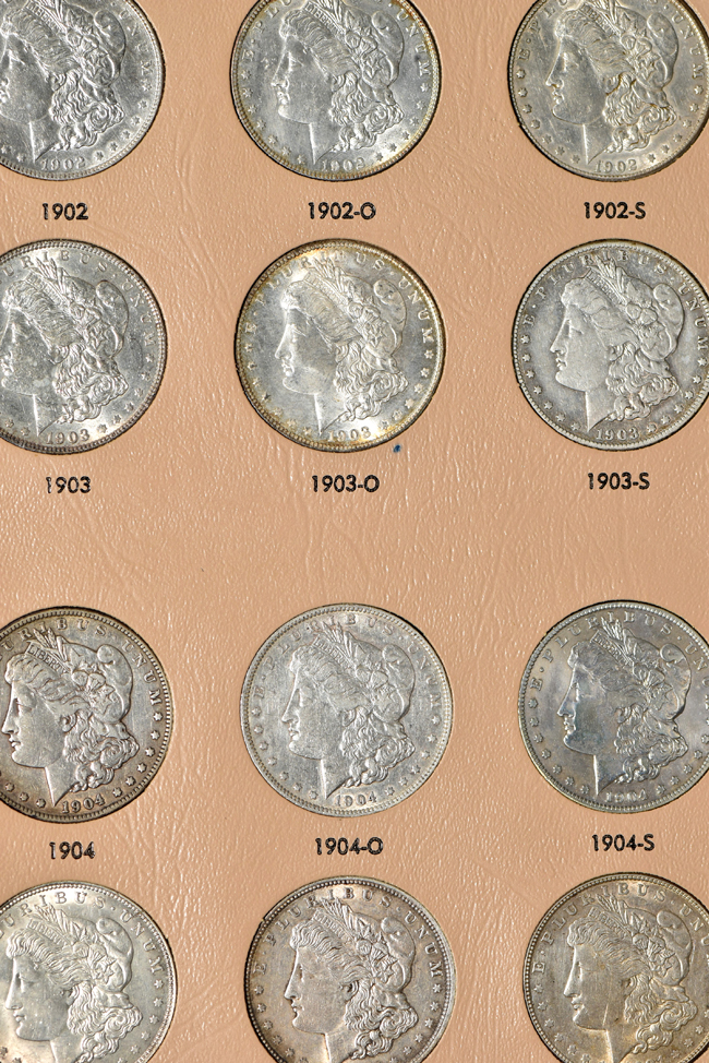 Collection of forty-six different Morgan silver dollars in a Dansco 7179 album 