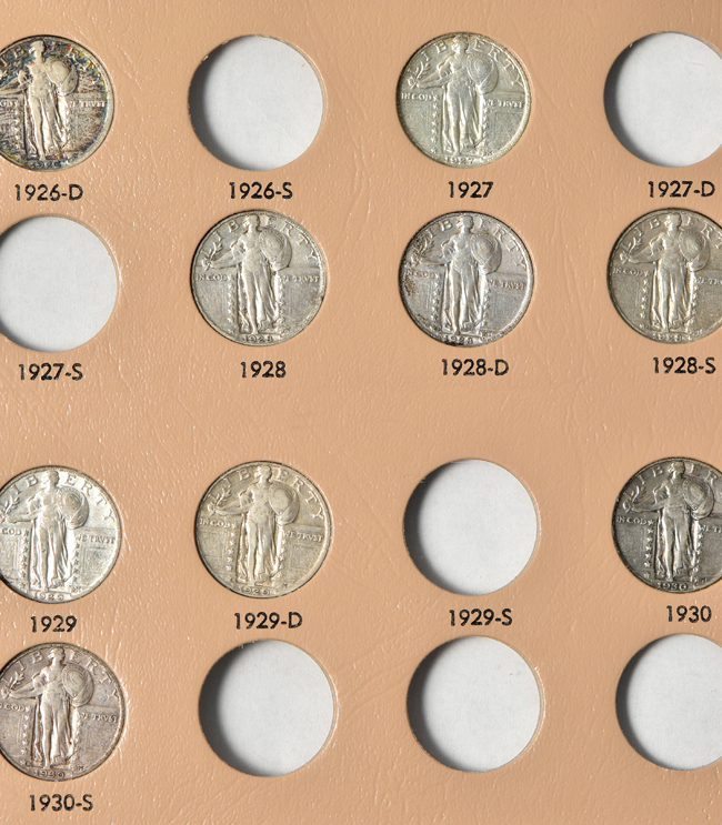 Twenty-four different Standing Liberty quarters in a Dansco 7132 album