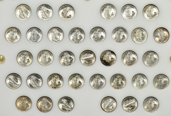 Collection of Mercury dimes and Franklin half-dollars