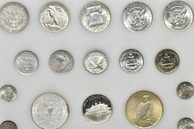 Twenty-seven United States 20th century type coins in a Capital Plastics holder