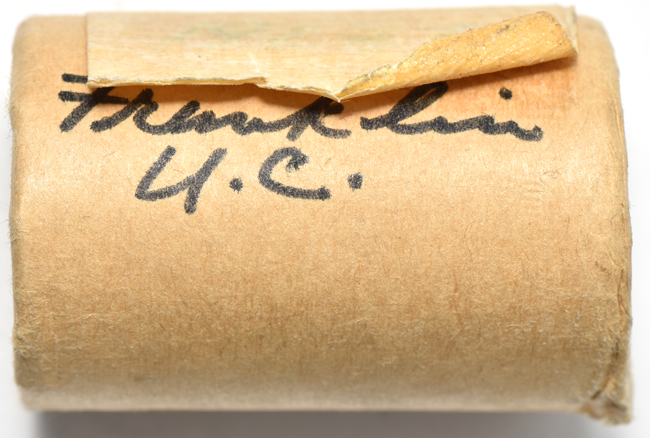 Seven bank wrapped rolls of 1963 Franklin half-dollars
