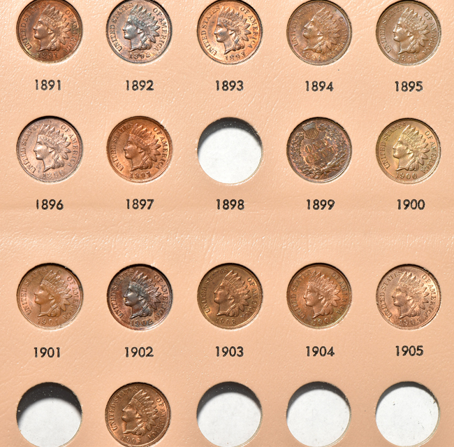 Collection of three Flying Eagle cents and forty Indian Head cents in a Dansco 7101 album