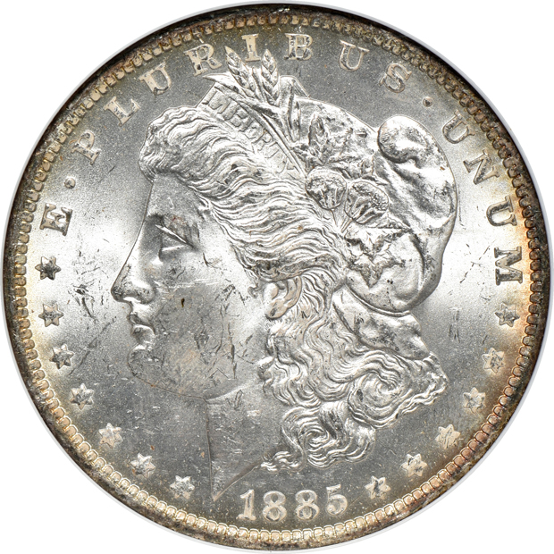 1880-S MS-65 Star, 1885-O MS-63 Star, and an 1886 MS-63 Star, all NGC CAC