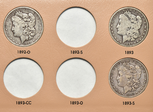 Collection of thirty-four different Morgan silver dollars in a Dansco 7179 album