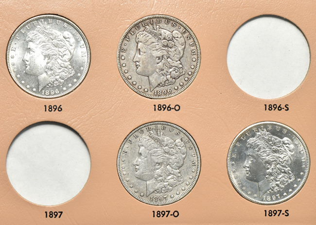 Collection of thirty-four different Morgan silver dollars in a Dansco 7179 album