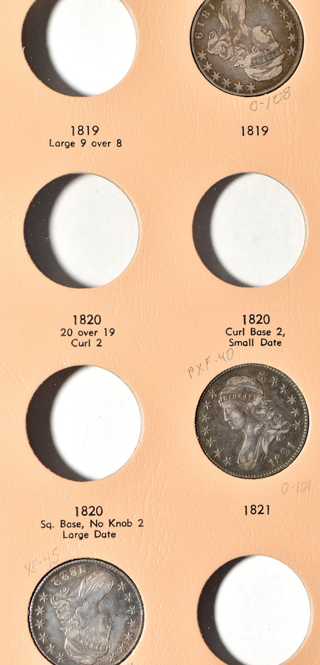Twelve different early half-dollars in a Dansco 6161 Volume 1 album