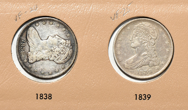 Twenty-four different early half-dollars in a Dansco 6151 Volume 2 album