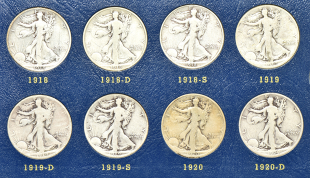 Complete collection of Walking Liberty half-dollars in two Whitman albums