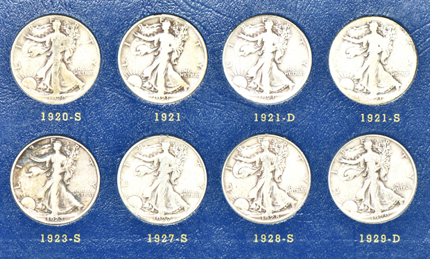 Complete collection of Walking Liberty half-dollars in two Whitman albums
