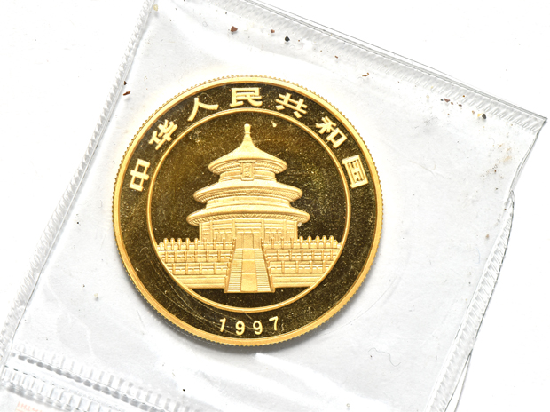 China - 1997 lg. date 1oz gold Panda 100 yuan sealed with ribbon, and a 1999 lg. date serifs 1oz gold Panda 100 yuan double sealed