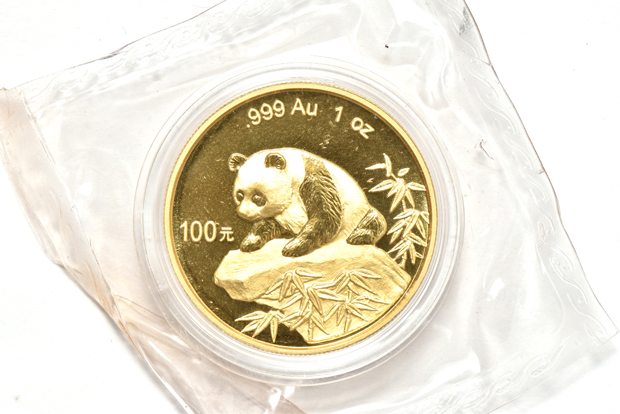 China - 1997 lg. date 1oz gold Panda 100 yuan sealed with ribbon, and a 1999 lg. date serifs 1oz gold Panda 100 yuan double sealed
