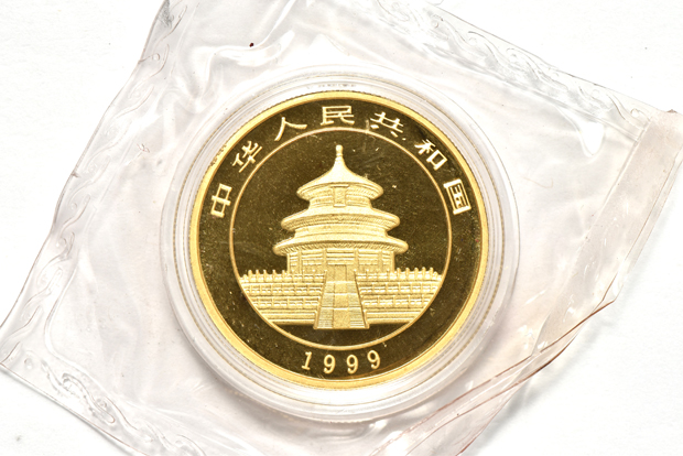 China - 1997 lg. date 1oz gold Panda 100 yuan sealed with ribbon, and a 1999 lg. date serifs 1oz gold Panda 100 yuan double sealed