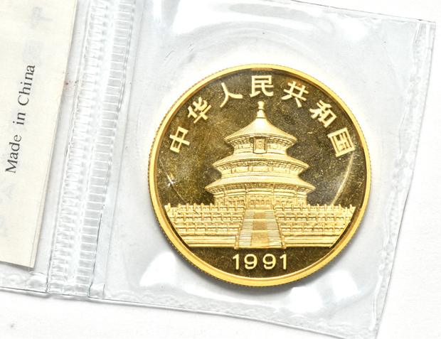China - 1990 lg. date 1oz gold Panda 100 yuan sealed, and a 1991 sm. date 1oz  gold Panda 100 yuan sealed with ribbon