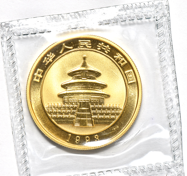 China - 1992 sm. date 1oz gold Panda 100 yuan sealed with ribbon, and a 1993 lg. date 1oz gold Panda 100 yuan sealed with ribbon