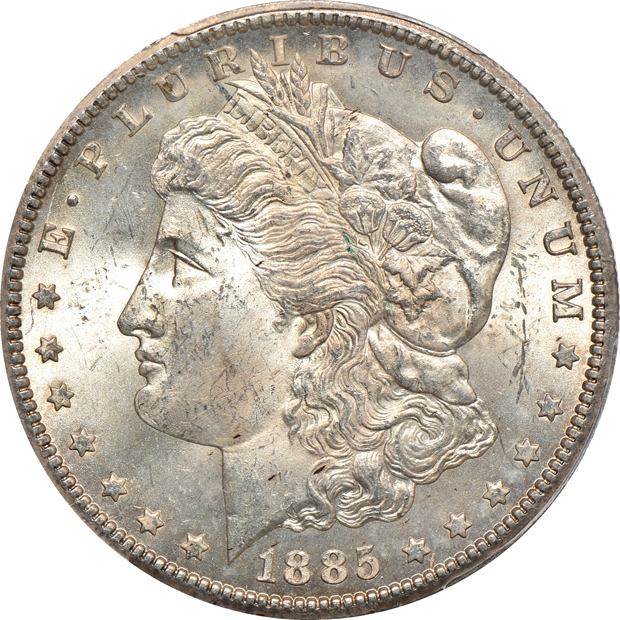 Four different Morgan silver dollars certified by PCGS