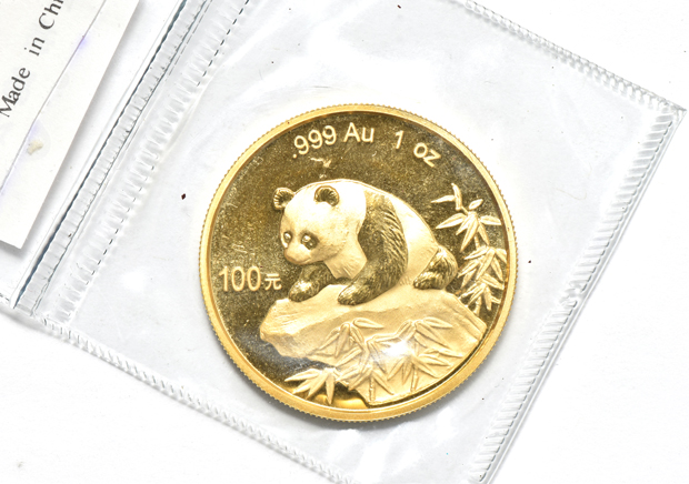 China - 1997 lg. date 1oz gold Panda 100 yuan sealed with ribbon, and a 1999 lg. date plain 1 1oz gold Panda 100 yuan sealed with ribbon