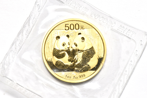 China - 2008 1oz gold Panda 500 yuan sealed with ribbon, 2009 1oz gold Panda 500 yuan sealed, and a 2010 1oz gold Panda 500 yuan sealed