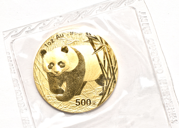 China - 2002 1oz gold Panda 500 yuan sealed, 2003 frosted 1oz gold Panda 500 yuan double sealed, and a 2004 1oz gold Panda 500 yuan sealed